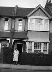 DJW's home in Chiswick,
                  with Mum at the front gate